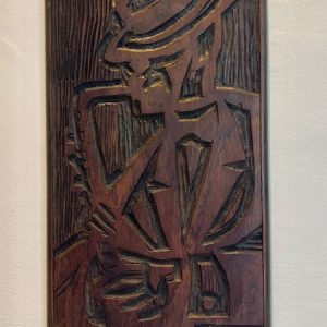 Poty Lazzarotto, talha em madeira 40 x 23 cm representando saxofoniosta